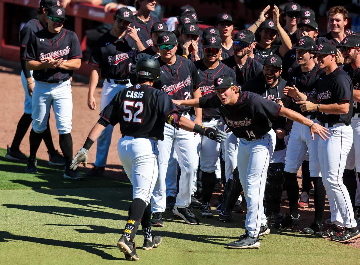 South Carolina Gamecocks infielder Gavin Casas (52) celebrates his first home run of the game against the Clemson Tigers at Founders Park in Columbia, SC, March 5, 2023.