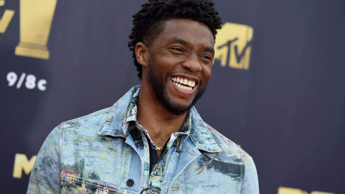 FILE - In this Saturday, June 16, 2018 file photo, Chadwick Boseman arrives at the MTV Movie and TV Awards at the Barker Hangar in Santa Monica, Calif. Actor Chadwick Boseman, who played Black icons Jackie Robinson and James Brown before finding fame as the regal Black Panther in the Marvel cinematic universe, has died of cancer. His representative says Boseman died Friday, Aug. 28, 2020 in Los Angeles after a four-year battle with colon cancer. He was 43. (Photo by Jordan Strauss/Invision/AP, File)
