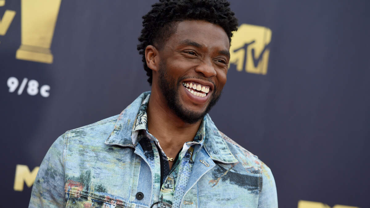 FILE - In this Saturday, June 16, 2018 file photo, Chadwick Boseman arrives at the MTV Movie and TV Awards at the Barker Hangar in Santa Monica, Calif. Actor Chadwick Boseman, who played Black icons Jackie Robinson and James Brown before finding fame as the regal Black Panther in the Marvel cinematic universe, has died of cancer. His representative says Boseman died Friday, Aug. 28, 2020 in Los Angeles after a four-year battle with colon cancer. He was 43. (Photo by Jordan Strauss/Invision/AP, File)
