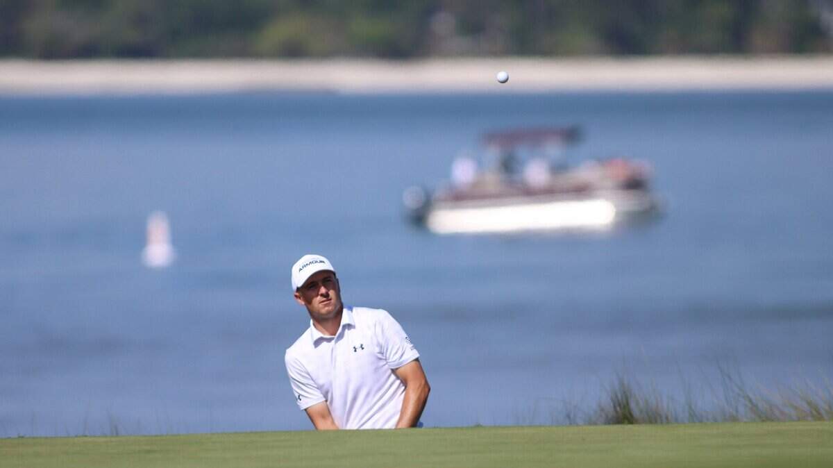 Jordan Spieth watches his ball approach the 18th green during the second round of the RBC Heritage Presented by Boeing at Harbour Town Golf Links on Friday, April 14, 2023 in Sea Pines on Hilton Head Island.