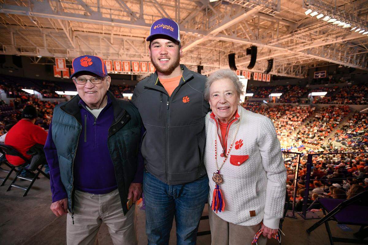 Clemson basketball fan Paula Grooms, her grandson Jag and husband Franklin during the Tigers game against Pitt on Jan. 22, 2022.