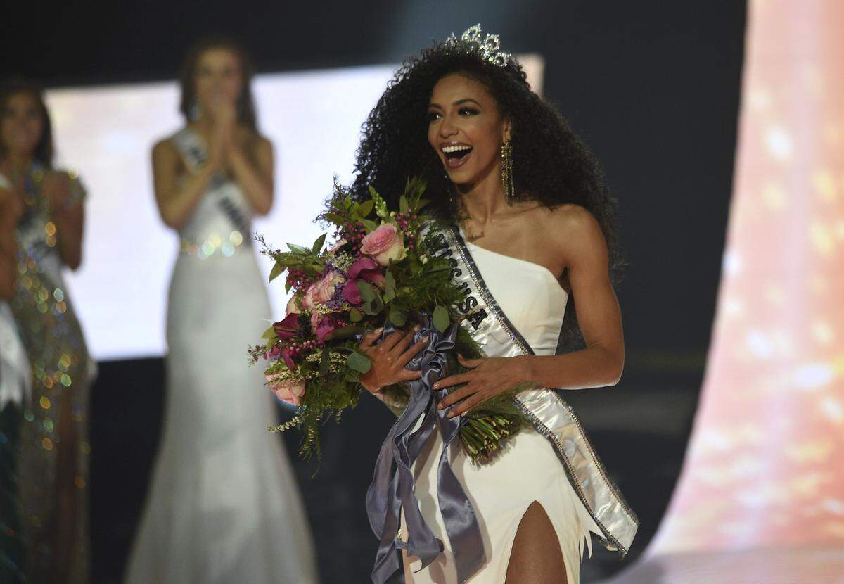 Miss USA Cheslie Kryst, who grew up in the Charlotte area and was an attorney at an uptown Charlotte law firm until becoming Miss USA last spring, will compete for the title of Miss Universe on Sunday.