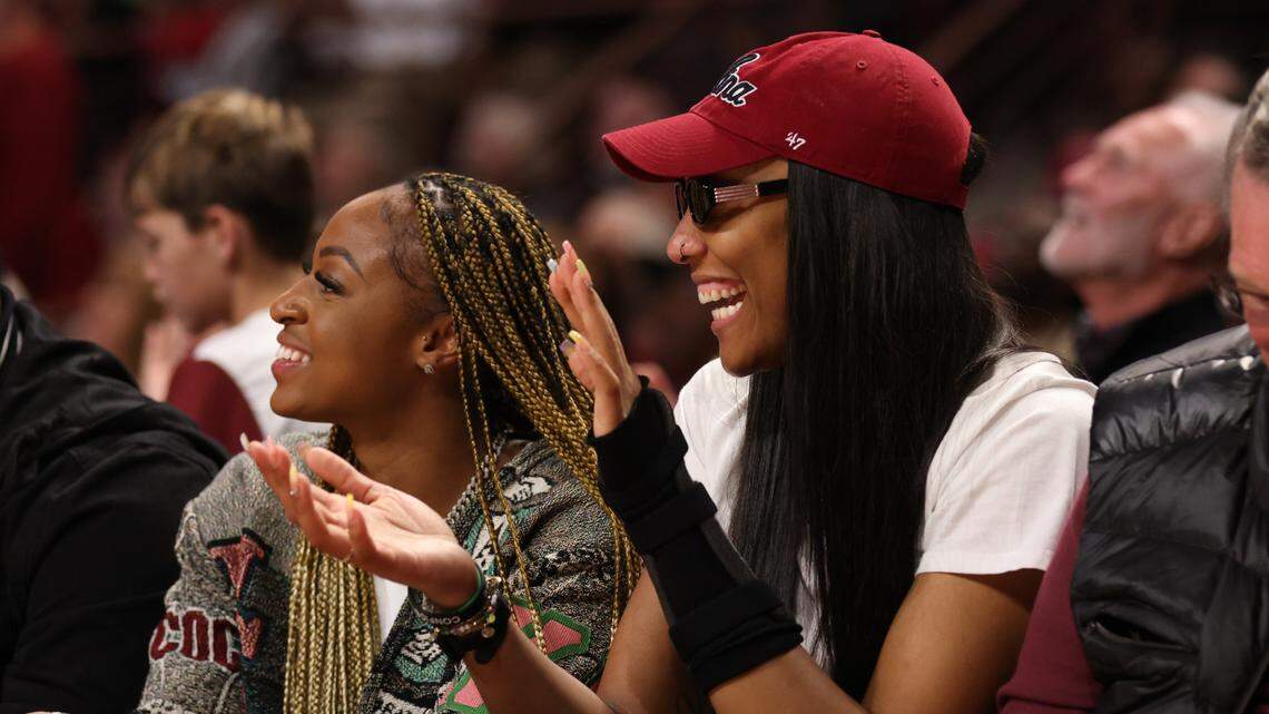 Former South Carolina players A’ja Wilson and Tiffany Mitchell cheer during the second half of the Gamecocks’ game against the visiting Terrapins at Colonial Life Arena on Sunday, November 12, 2023.