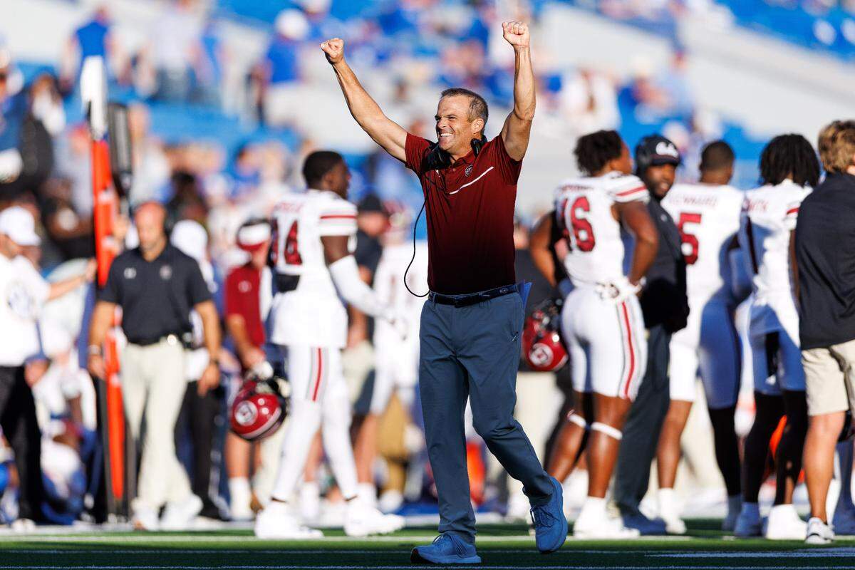 South Carolina Gamecocks head coach Shane Beamer celebrates during the fourth quarter against the Kentucky Wildcats at Kroger Field.
