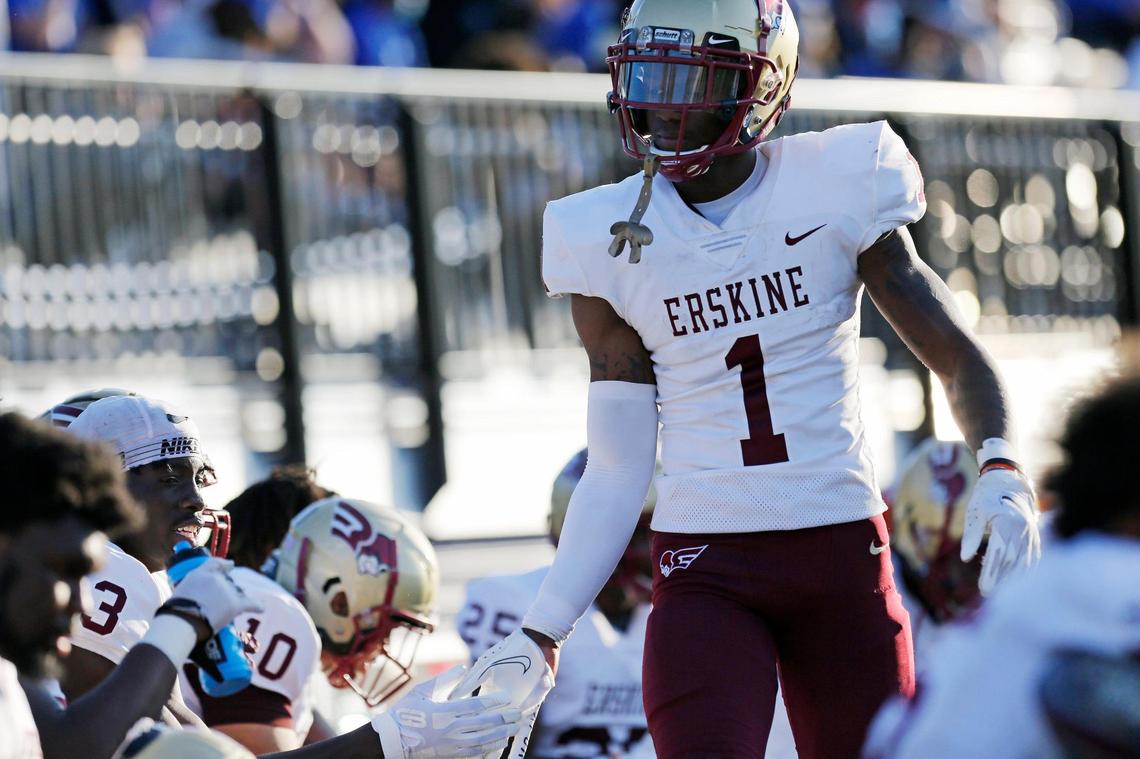 Erskine wide receiver Senika McKie (1) celebrates with his teammates late in the fourth quarter of the game Saturday.