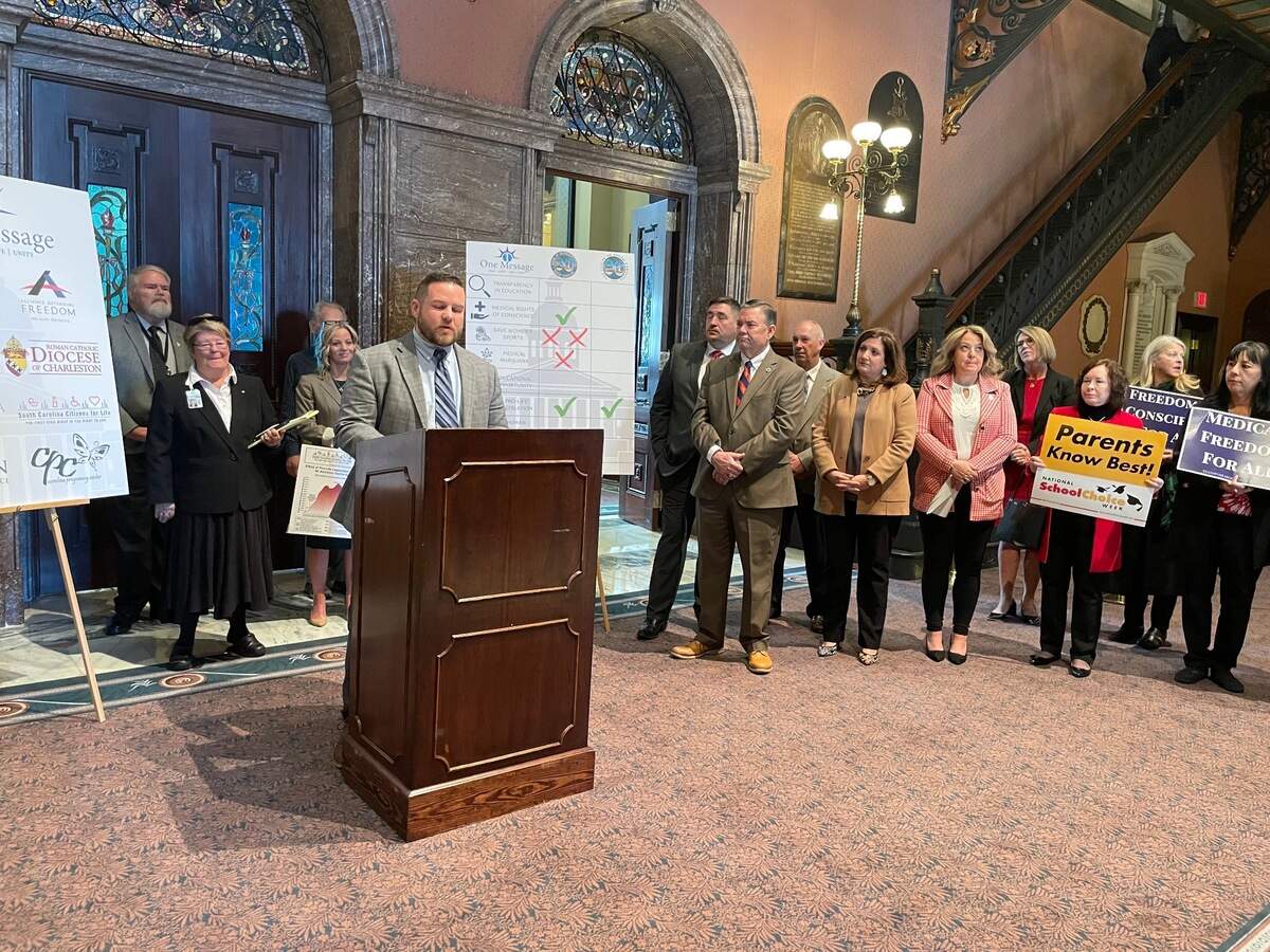 South Carolina Rep. RJ May, R-Lexington, center, speaks Wednesday, Jan. 12, 2021, at the State House in Columbia, S.C., about 2022 priorities.
