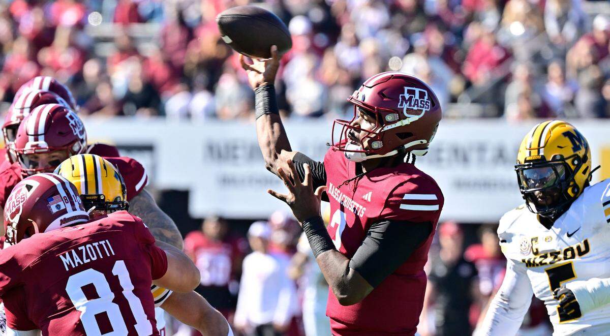 Oct 12, 2024; Amherst, Massachusetts, USA; Massachusetts Minutemen quarterback Taisun Phommachanh (3) throws a pass against the Missouri Tigers during the first half at Warren McGuirk Alumni Stadium.