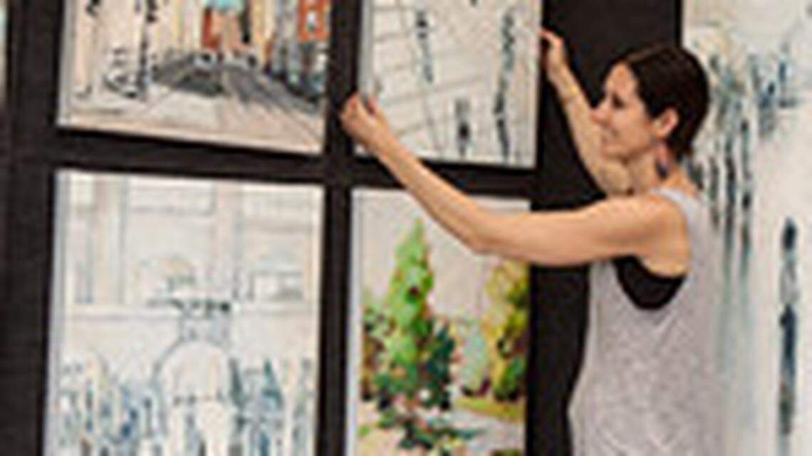 Janina Ellis arranges her work at a previous Artisphere.