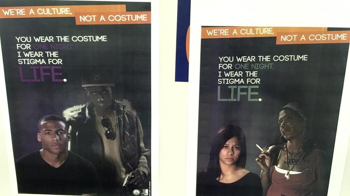 This Thursday, Oct. 26, 2017 photo shows a poster displayed on the University of New Hampshire campus in Durham, N.H., to encourage students avoid Halloween costumes that can be seen as racially or culturally offensive. Administrators at some universities across the country are increasingly concerned that certain costumes are becoming flash points in the campus debate over race and culture.