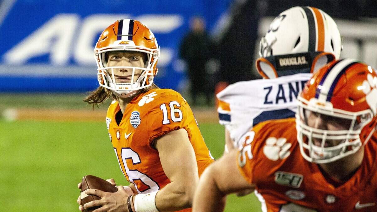 Clemson football QB Trevor Lawrence (16) snaps the ball at the ACC Championship game starts at Bank of America Stadium in Charlotte on Saturday, Dec. 7, 2019.