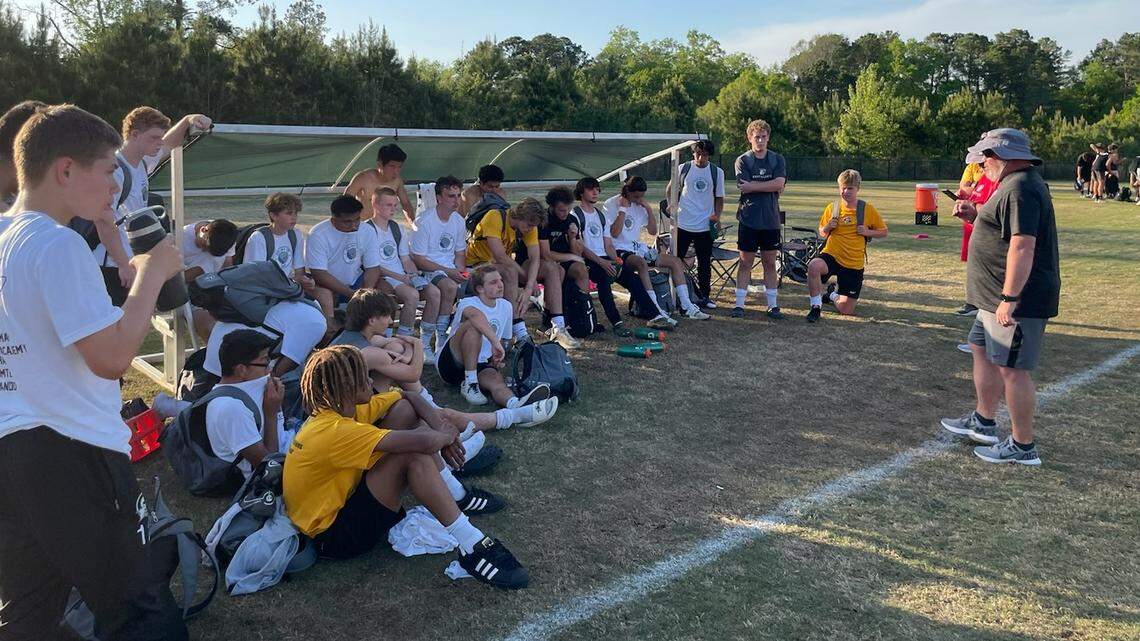 Gray Collegiate coach Kevin Heise talks to his team after the match against Wando in the Nike Palmetto Cup on Tuesday, April 12, 2022.