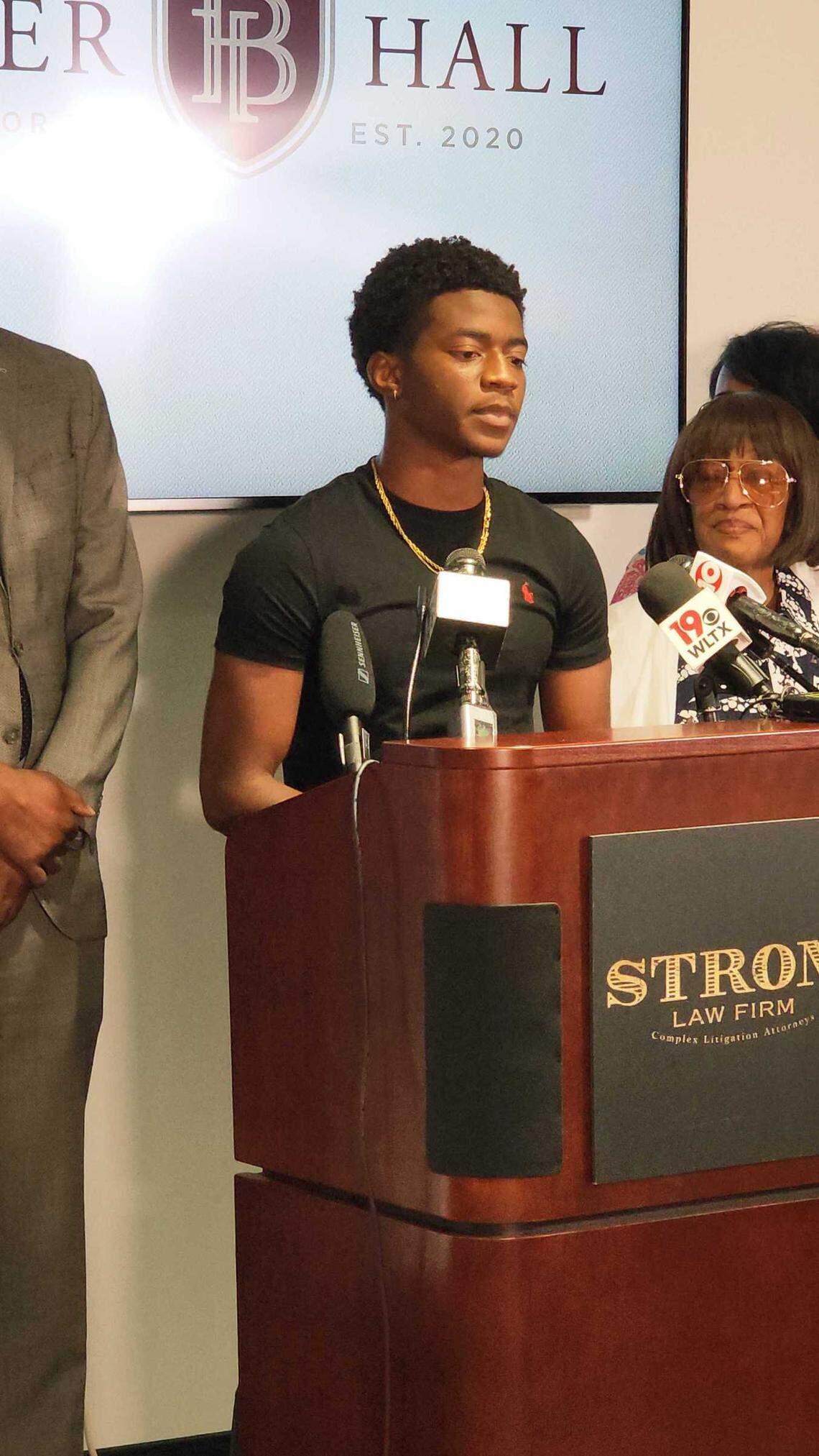 Kiestin Jackson, the eldest son of Byron Jackson, who mysteriously died while in police custody in late June, speaks before reporters on July 15, 2025.