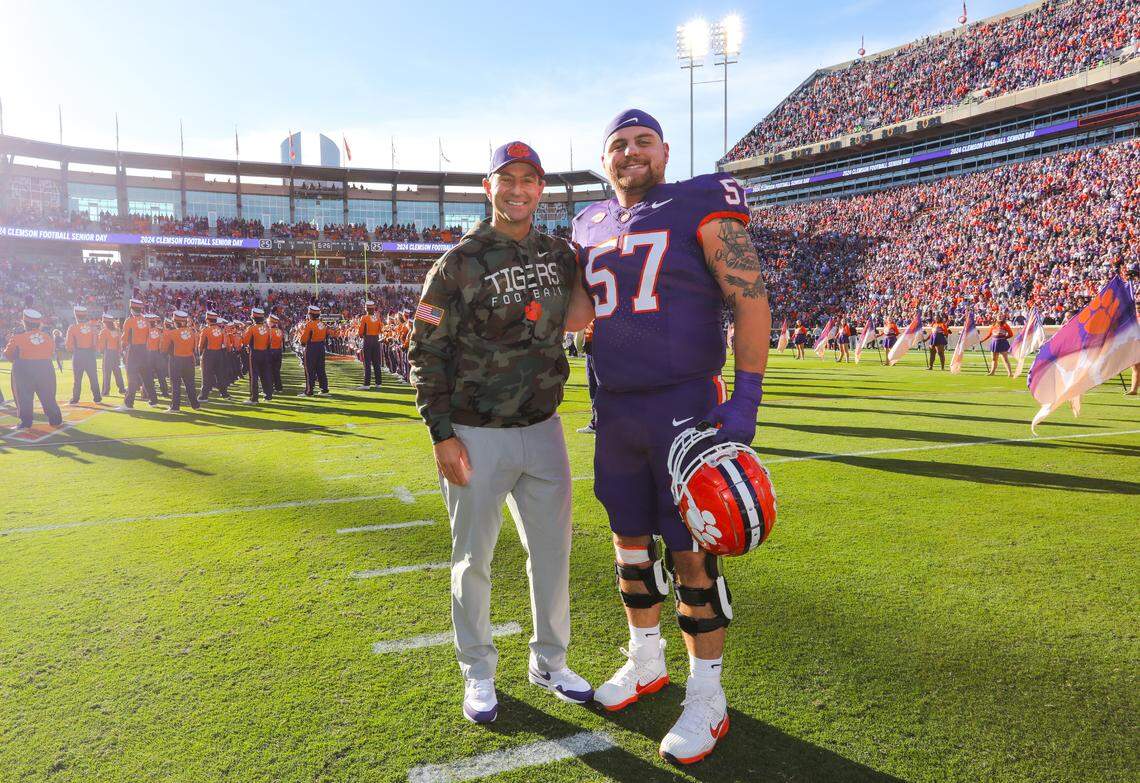 Clemson offensive lineman Jackson Hall and coach Dabo Swinney on the team’s 2024 senior day against The Citadel