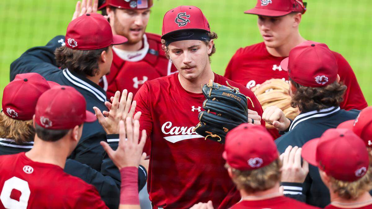 South Carolina Gamecocks Alex Philpott (11) is congratulated after the first inning during their fall exhibition game against Charlotte Sunday, 11/2/25.
