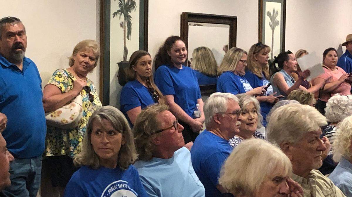 Members of the public lined up along the walls when the meeting ran out of public seats during a joint meeting Wednesday between Lexington Town Council and Lexington County Council at Lexington’s town hall about the Smallwood Cove development.