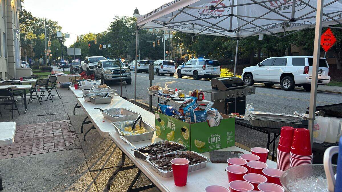 The Catholic Student Mission had tables set up for an apparent barbecue on Greene and Pickens streets when an alert for an active shooter went off on the University of South Carolina campus on Aug. 24, 2025.