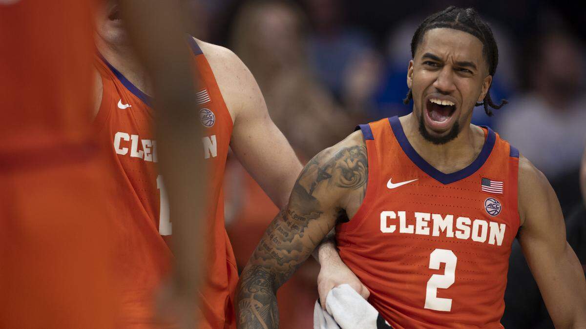 Clemson guard Dillon Hunter (2) react as the Tigers take a 58-41 lead over North Carolina in the second half on Thursday, March 12, 2026, during the quarterfinals of the ACC Tournament at Spectrum Center in Charlotte, N.C.