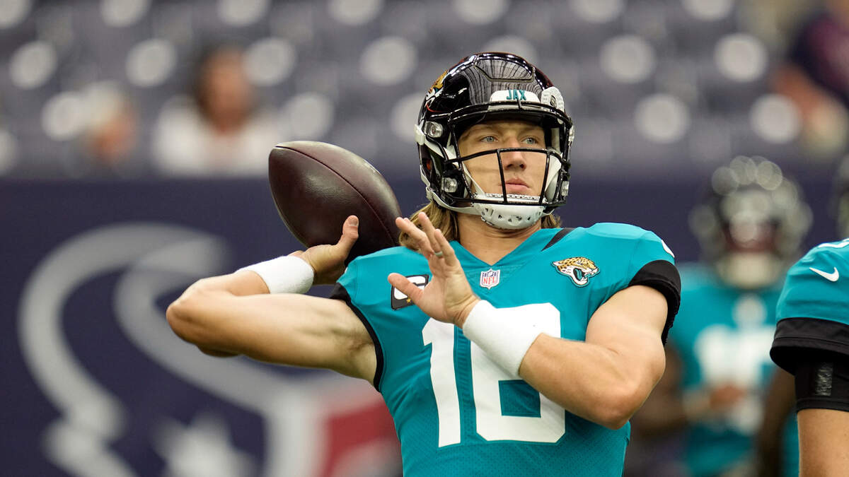 Jacksonville Jaguars quarterback Trevor Lawrence (16) warms up before an NFL football game against the Houston Texans Sunday, Sept. 12, 2021, in Houston. (AP Photo/Sam Craft)