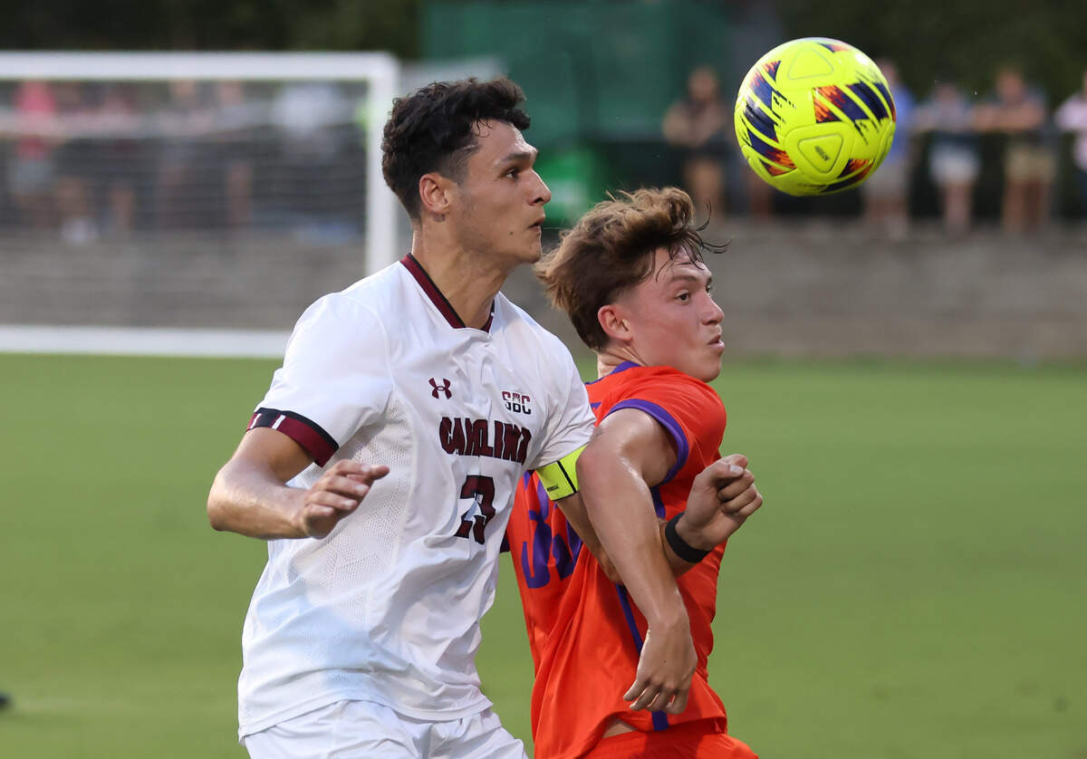 South Carolina forward Harrison Myring (23) and Clemson defender Arthur Duquenne (33) go for a loose ball during the Gamecocks’ game against Tigers in Columbia on Friday, August 30, 2024.