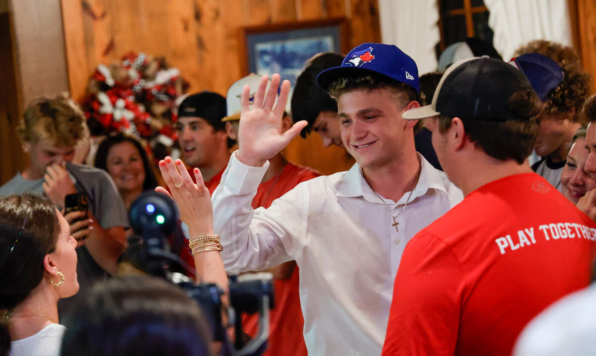 Tucker Toman celebrates with family and friends after being picked to play for the Toronto Blue Jays on Sunday, July 17, 2022.