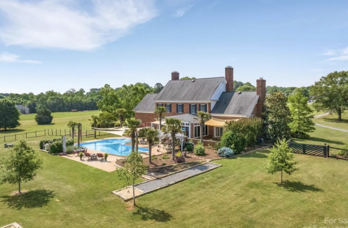 The house has a pool, fire pit, bocce court, horseshoe pit.