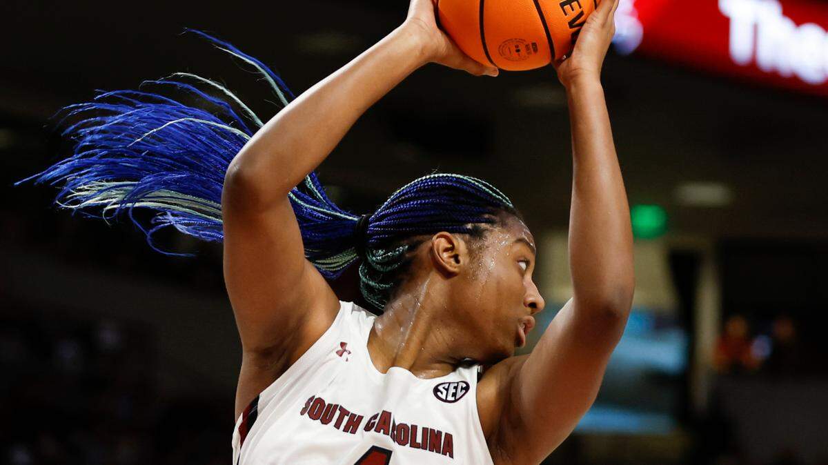 South Carolina forward Aliyah Boston (4) pulls down a rebound against Arkansas during the second half of an NCAA college basketball game in Columbia, S.C., Sunday, Jan. 22, 2023. (AP Photo/Nell Redmond)