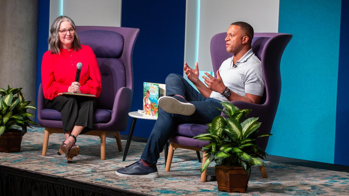 Richland Library Executive Director Melanie Huggins interviews NBC journalist Craig Melvin, who grew up in Columbia, at a library lecture attended by hundreds earlier this year.