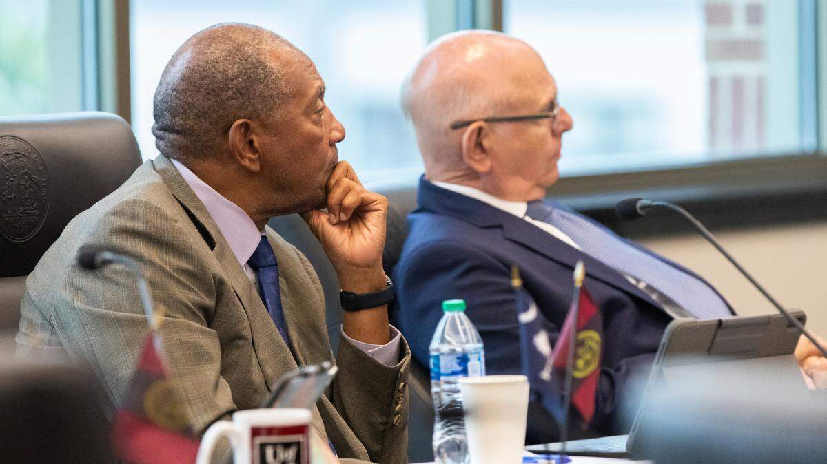 Alex English and Hugh Mobley listen to a presentation to the University of South Carolina Board of Trustees on Friday, August 19, 2022.