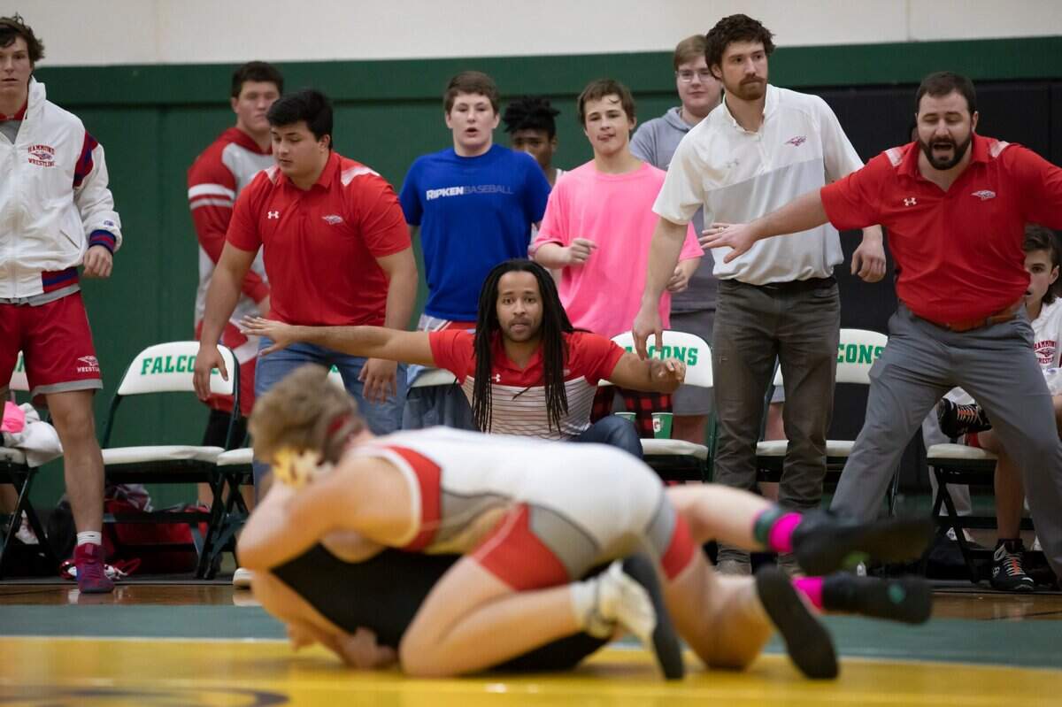 Members of the Hammond School wrestling team watch during the SCISA 2022 Duals State Wrestling Tournament at Ben Lippen on Saturday, February 5, 2022.