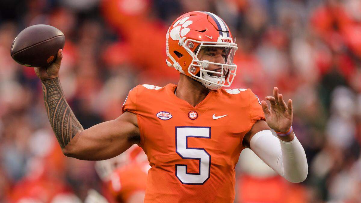 Clemson quarterback DJ Uiagalelei passes the ball in the first half of an NCAA college football game against Miami on Saturday, Nov. 19, 2022, in Clemson, S.C. (AP Photo/Jacob Kupferman)