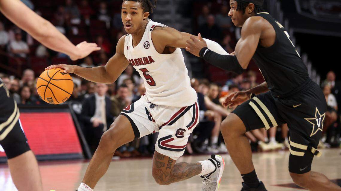 South Carolina Gamecocks guard Meechie Johnson (5) breaks for the basket, past Vanderbilt Commodores guard Ezra Manjon (5), during South Carolina’s game against visiting Vanderbilt at Colonial Life Arena in Columbia on Tuesday, February 14, 2023.