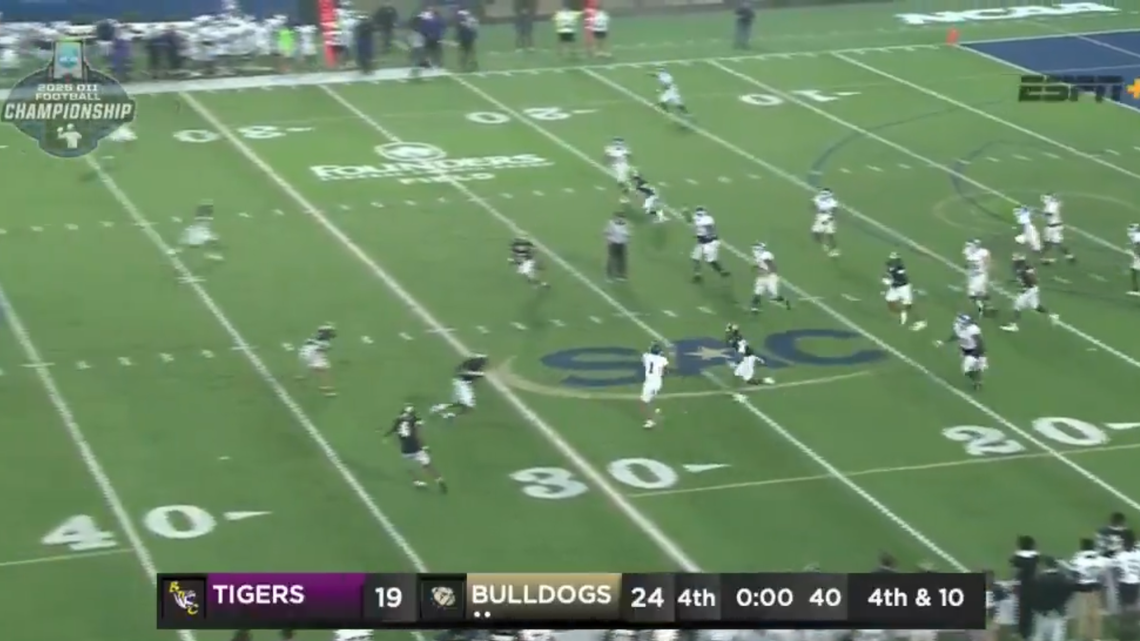 Benedict College WR and former QB Tre Simmons (No. 1) rears back to unleash a cross-field backwards pass to fellow WR Malik Mullins (No. 3) during an NCAA Division II playoff game on Saturday. Mullins scored a miraculous 86-yard touchdown on the play, which gave Benedict a win in the final 19 seconds.