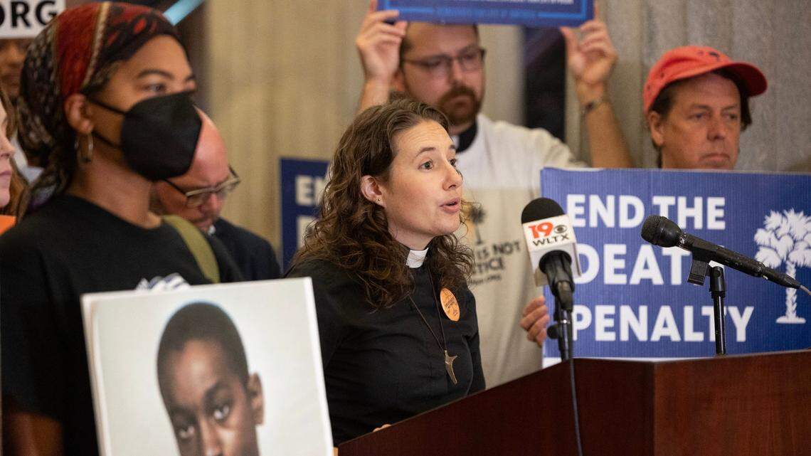 Rev. Hillary Taylor, executive director of South Carolinians for Alternatives to the Death Penalty, speaks at the South Carolina State House and asks Gov. Henry McMaster to grant clemency to Khalil Allah, formerly known as Freddie Owens, and reduce his death sentence to life in prison on Thursday, Sept. 12, 2024.