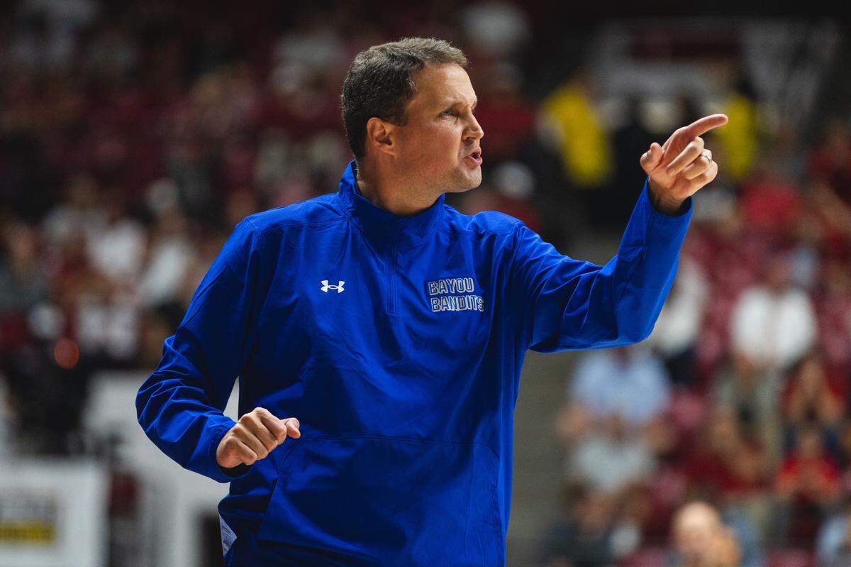 Nov 11, 2024; Tuscaloosa, Alabama, USA; McNeese State Cowboys head coach Will Wade gives instructions to his players from the bench during the first half at Coleman Coliseum.