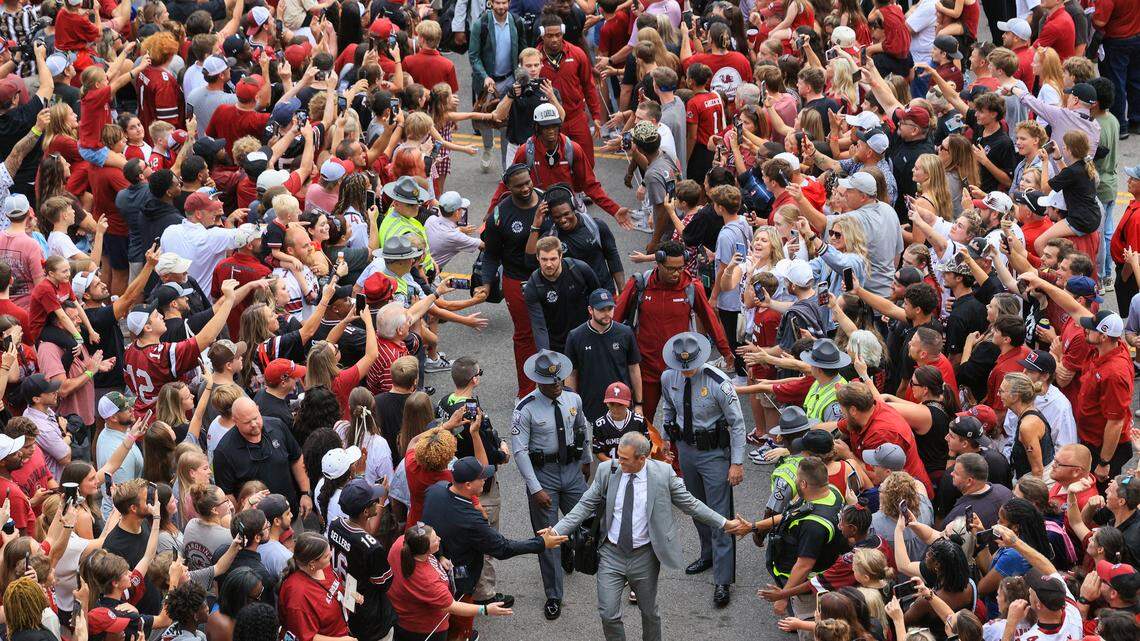 South Carolina head coach Shane Beamer greets fans as he leads his team to play Kentucky at Williams-Brice Stadium on Saturday, September 27, 2025.