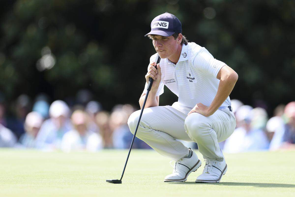 Amateur Mason Howell of the United States lines up a putt on the first green during Thursday the first round of the 2026 Masters Tournament at Augusta National Golf Club.