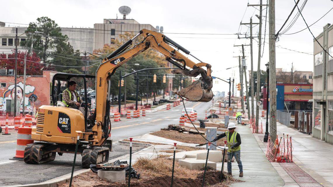Crews continue work on new sidewalks along South Main Street on Tuesday, Dec. 10, 2024.