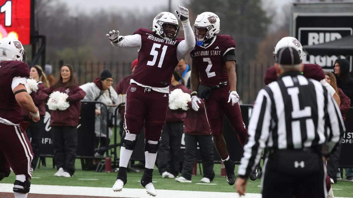 Missouri State offensive lineman Ebubedike Nnabugwu (51) celebrates with a teammate after a touchdown. Nnabugwu committed to South Carolina on Monday.