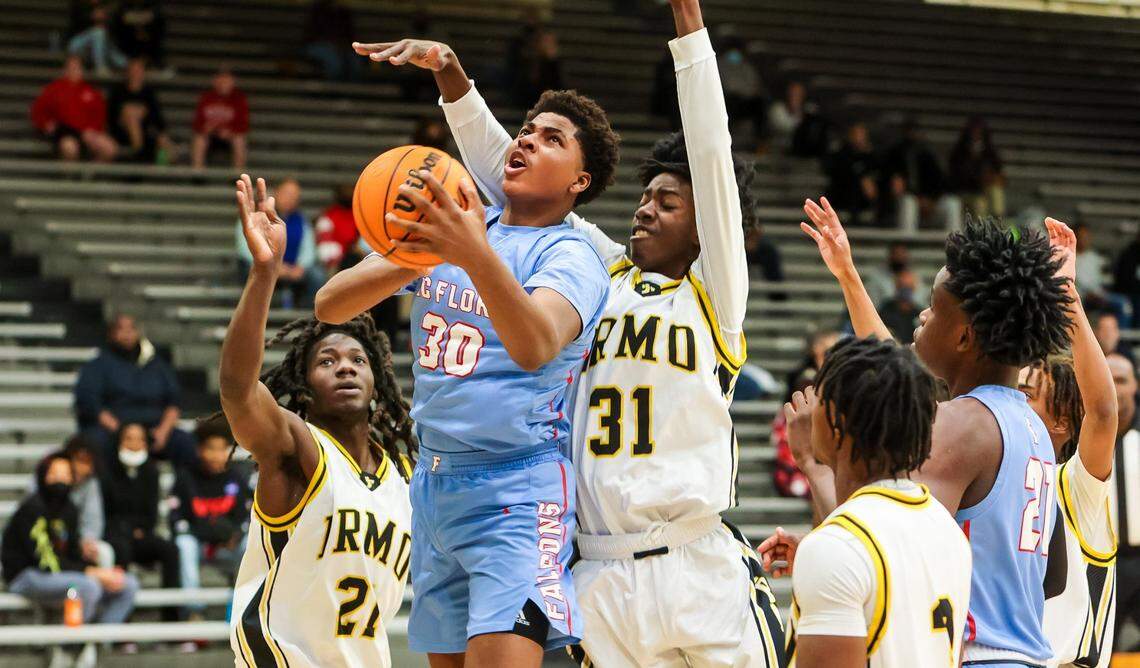 A.C. Flora Falcons Collin Murray-Boyles (30) drives against Irmo during a game Jan. 14, 2022.