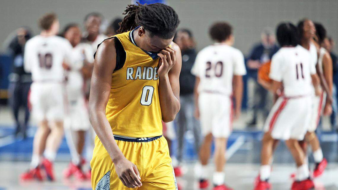 Keenan High School’s Marcus Simpson Jr. reacts as the Raiders fall to Kamauri Hunter in Saturday’s Class 3A boys Lower State championship game at the Florence Center.