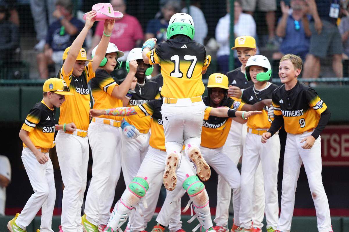 Irmo’s Brody Miller (17) of celebrates with teammates after hitting a home run against Nevada in the second inning of a Little League World Series game at Howard J. Lamade Stadium in Williamsport, Pa.