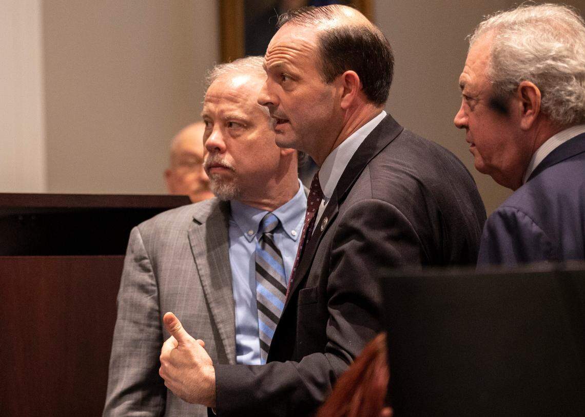 From left, Prosecutor Creighton Waters, attorney general Alan Wilson and defense attorney Dick Harpootlian speak to the judge during the murder trial of Alex Murdaugh at the Colleton County Courthouse in Walterboro on Thursday, March 2, 2023. Andrew J. Whitaker/The Post and Courier/Pool