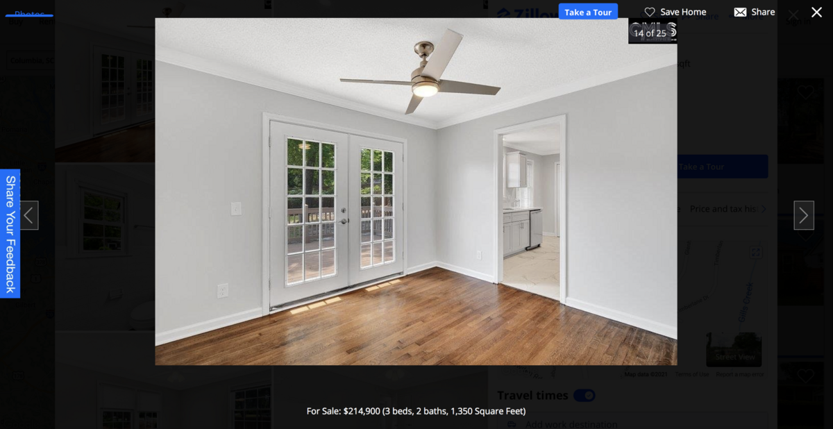 The home features tile and hardwood floors, new cabinets, quartz counter tops and stainless steel appliances.