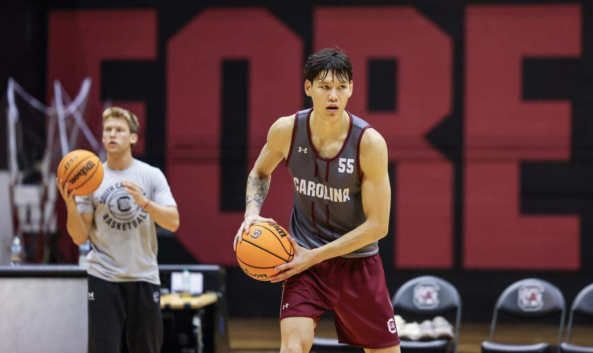 South Carolina guard Mike Sharavjamts (55) runs drills during the Gamecocks’ practice  Oct. 2.