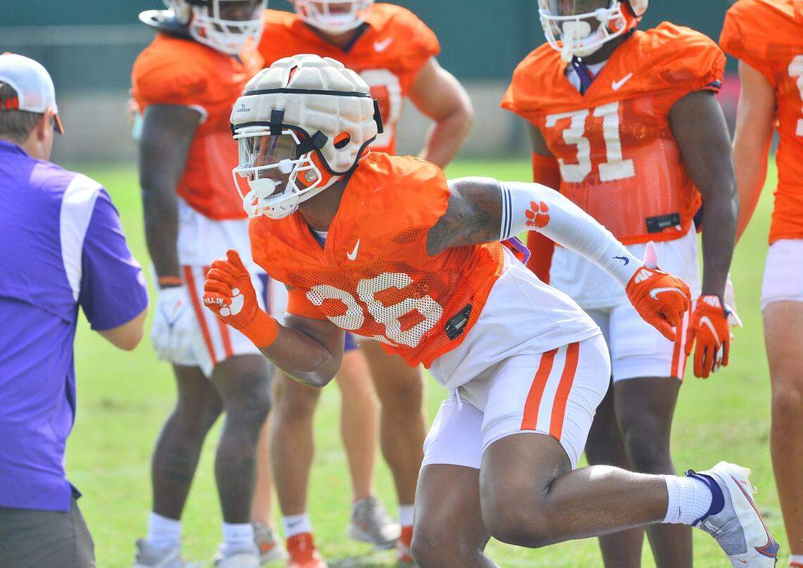 The Clemson Tigers held football practice at the school’s football practice fields in Clemson on Friday, August 12, 2022. Clemson linebacker T.J. Dudley (26) goes through drills.