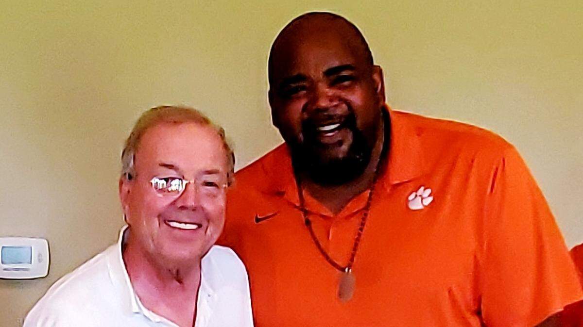 Former Clemson basketball player and event organizer Wayne Buckingham (right) present former Tigers men’s basketball coach and current Coastal Carolina men’s basketball coach Cliff Ellis with an award during the second annual golf tournament fundraiser on Monday, June 7, 2021 at at Cross Creek Golf Course in Seneca, S.C.