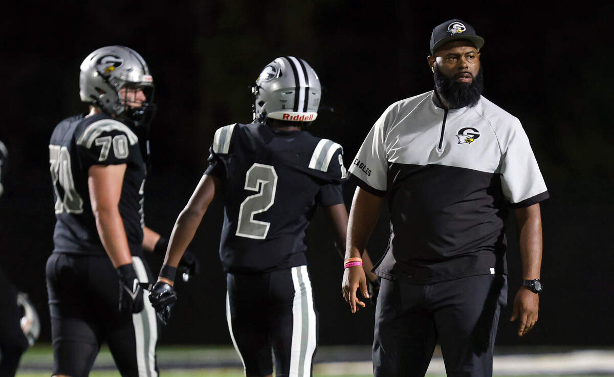 Gray Collegiate coach De’Angelo Bryant looks toward the Brookland-Cayce sideline after the Bearcats opted not to shake hands with the War Eagles after Tuesday’s game.
