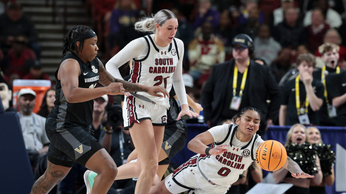 University of South Carolina’s Chloe Kitts (21) and Te-Hina Paopao (0) go for a loose ball with Vanderbilt’s Jordyn Oliver (11) during the second half of action in the SEC Tournament at the Bon Secours Wellness Arena in Greenville on Friday, Mar. 7, 2025.