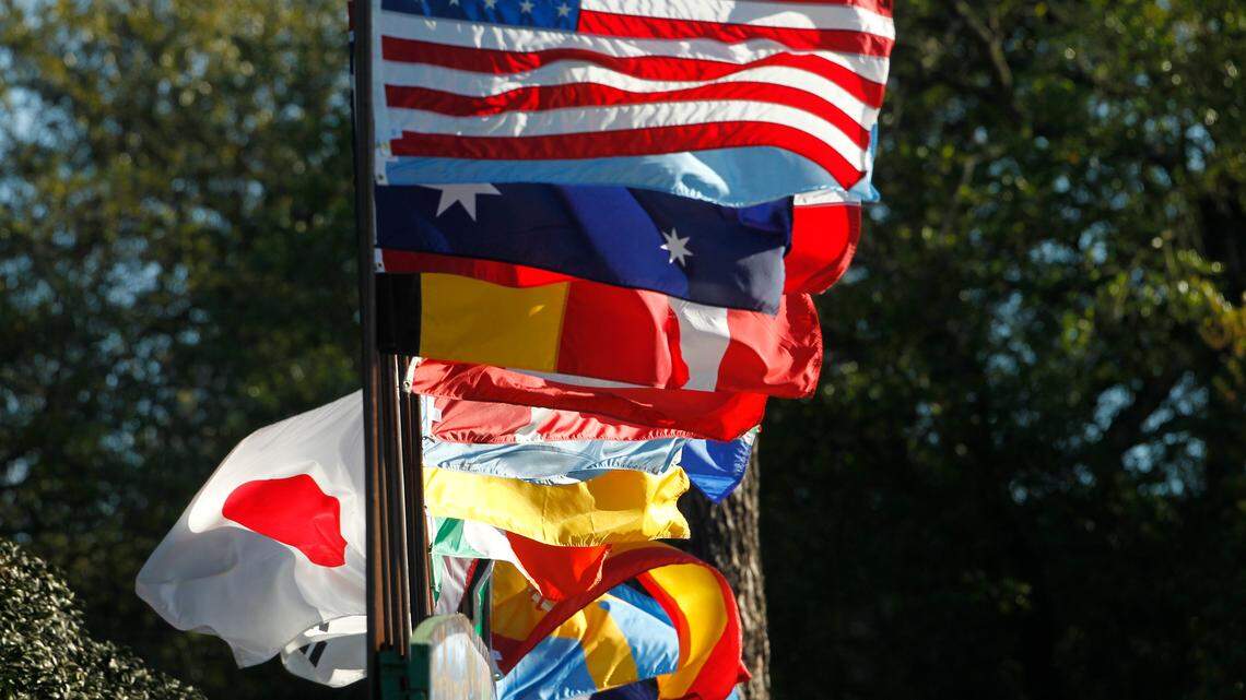 The flags at the Main scoreboard were blowing from high winds during the second round of The Masters at Augusta National Golf Club in Augusta, GA, Friday, April 7, 2017.