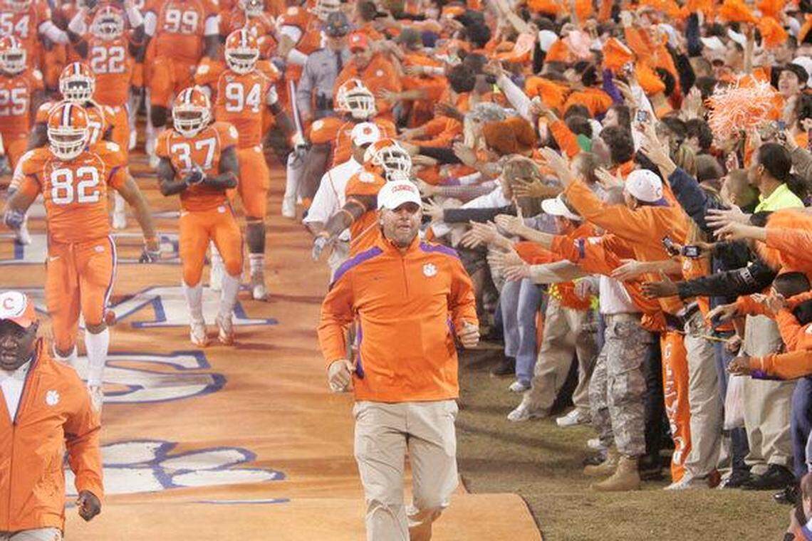 U.S. Open champion Lucas Glover heads down the hill as the Tigers head onto the field during their game against the Seminoles at Memorial Stadium in Clemson, SC, Saturday, November 7, 2009.
